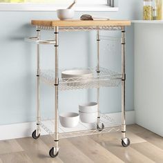 a kitchen cart with two bowls on it