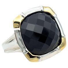 Ring Size: 8 This beautiful Lorenzo black onyx ring exudes a bold and sophisticated charm, combining the rich allure of onyx with the timeless elegance of 18 karat yellow gold and sterling silver. At its heart lies a square checkerboard cushion onyx, meticulously bezel-set to accentuate its mesmerizing depth and luster. Surrounding this captivating centerpiece is a harmonious blend of yellow gold and sterling silver, creating a striking contrast that enhances the ring's overall aesthetic. The combination of metals lends versatility to the ring, allowing it to effortlessly complement both casual and formal attire. With its exquisite craftsmanship and sophisticated allure, this Lorenzo black onyx ring is sure to make a statement and is the perfect addition to any fine jewelry collection. Thi Luxury Black Enamel Rectangular Ring, Gold Onyx Jewelry With Black Enamel, Faceted Round Onyx Jewelry, Black Enamel Onyx Round Rings, Black Ring Set, Luxury Onyx Ring With Polished Finish, Onyx Colour, Black Ring, Black Onyx Ring