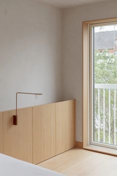 an empty bedroom with a sliding glass door