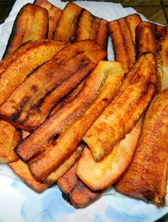 french fries are on a plate with paper towels