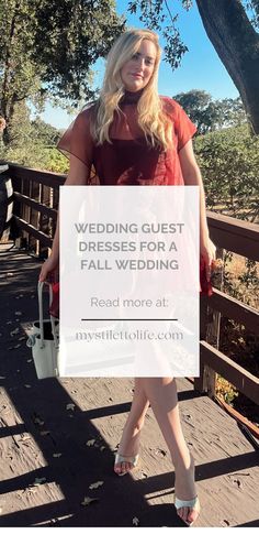 a woman standing on a bridge with the words, wedding guest dresses for a fall wedding read more at