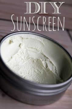 diy sunscreen in a metal container on a wooden table with text overlay