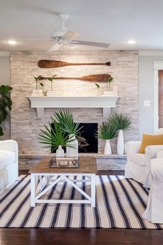 a living room filled with furniture and a fire place