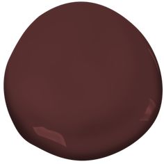 a dark brown paint color is shown in this image, it looks like an oval shape