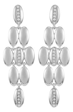 Bring party-ready vibes to any ensemble with these chandelier earrings featuring round-cut crystals and silvertone plating. 2.6" drop; 0.9" width Post back Silvertone plate/glass Imported Crystal Chandelier Earrings, Crystal Chandelier, Chandelier Earrings, Vince Camuto, Round Cut, Nordstrom Rack, Silver Tone, Nordstrom, Plating