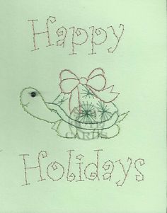 a hand embroidered happy holidays card with a turtle holding a basket and bow on it