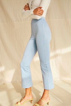 These trendy gingham pants feature a super soft material, high waist fit, and a pull on style! These have so many cute styling options and are perfect for the spring! We think they would be adorable paired with a white bodysuit or even a graphic tee and sneakers. Print Flare Pants, Bank Job, Gingham Fashion, Printed Flare Pants, Gingham Pants, Cute Pants, White Bodysuit, Gingham Print, Plaid Pants