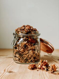 granola in a glass jar with the words honey lavender blueberry granola