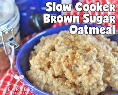 slow cooker brown sugar oatmeal in a blue bowl on a red and white checkered cloth