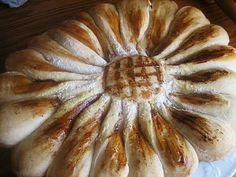 a loaf of bread sitting on top of a white plate