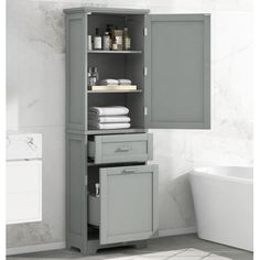 a bathroom cabinet with two doors and drawers