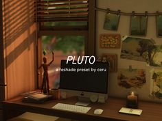 a desktop computer sitting on top of a wooden desk in front of a window with the words pluto above it