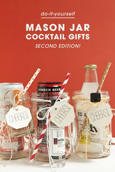 mason jar cocktail gifts on a table with red and white striped straws in them