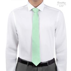 The pastel hues of the KT Mint necktie are perfect for spring. Solid mint ties feel charming, relaxing, and invigorating. Classic Tie For Semi-formal Spring Occasions, Classic Semi-formal Ties For Spring, Classic Ties For Semi-formal Spring Occasions, Elegant Spring Standard Ties, Classic White Ties For Spring, Classic Standard Tie For Spring, Classic White Spring Ties, Green Spring Ties, White Suit And Tie Accessories For Business In Spring