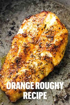 a close up of a piece of meat on a pan with the words orange roughy recipe