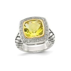 This glamorous ring has one large cushion cut vibrant yellow quartz gemstone and a halo of brilliant white diamonds of 1/10 carat (ctw). Crafted in antiqued cable sterling silver and accented with 14 karat yellow gold. 3.60 Carat (ctw) Lemon Quartz Cable Ring in Sterling Silver with 14K Gold Accents Size: 6.  Gender: female.  Age Group: adult. Silver Theme, Yellow Quartz, Lemon Quartz, Signature Jewelry, Quartz Ring, Wrap Rings, Diamond Sizes, Gold Accents, Diamond White