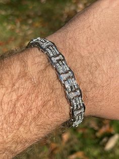 "Men's 12mm wide customized baguette diamond** bracelet Truly unique one of a kind design! Available in 7\" or 8.5\" Secure interlocking clasp Heavy 30.5 grams (8.5\" weight) 10.2ct simulated baguette diamonds (5A cz provides an amazingly super iced out shine Solid 925 silver Never fades or tarnishes Ships Fast!" Male Bracelets Diamond, Luxury Men's Diamond Bracelet, Diamond Bracelet Design Men, Bracelet Design For Men In Silver, Cool Mens Bracelets Diamond, Men Silver Bracelet Design Unique, Sterling Silver Bracelets For Men, Mens Silver Bracelets Unique, Silver Jewellery For Men