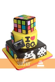 a cake made to look like a rubik's cube with the number 80 on it