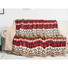 a couch with a blanket on top of it