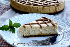 a piece of cheesecake on a plate with a fork