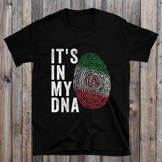 Celebrate your heritage with our stylish It's In My DNA Iran Flag Shirt. Show your pride, support your country, and wear your colors with passion. Don't miss out on this chance to showcase your patriotism. Order now and let your flag shine! * 100% ring-spun cotton * Sport Grey is 90% ring-spun cotton, 10% polyester * Dark Heather is 65% polyester, 35% cotton * 4.5 oz/yd² (153 g/m²) * Pre-shrunk * Shoulder-to-shoulder taping * Quarter-turned to avoid crease down the center * Blank product sourced from Bangladesh, Honduras, Haiti, Mexico, or Nicaragua Turkmenistan Flag, Kiribati Flag, Kyrgyzstan Flag, Seychelles Flag, Burundi Flag, Vanuatu Flag, Gambia Flag, Jordan Flag, Montenegro Flag