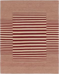 a red and white rug with stripes on it