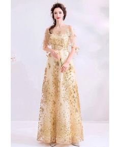 Buy Sparkly Bling Gold Long Party Dress With Sheer Neck Puffy Sleeves at wholesale price online. Free shipping and pro custom service since 2009. Spring Wedding Gold Gown, Champagne A-line Gown For Party, Gold Dress For Holiday Banquet, Gold Holiday Dress For Banquets, Gold Holiday Dress For Banquet, Spring Wedding Gold Evening Dress, Gold Holiday Banquet Dress, Spring Full Length Evening Dress For Wedding, Spring Wedding Full-length Evening Dress