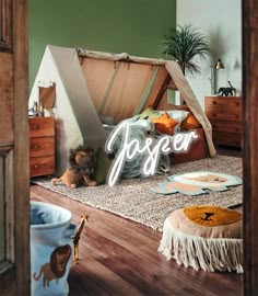 a child's bedroom with a teepee tent and stuffed animals on the floor