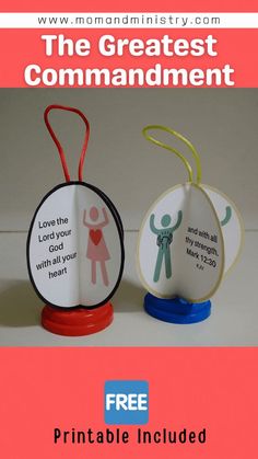 two paper ornaments with the words, the greatest commandment and free printable included