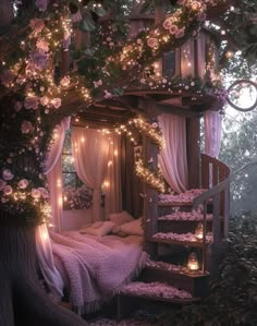 a tree house is decorated with fairy lights and pink flowers on the outside, along with stairs leading up to it