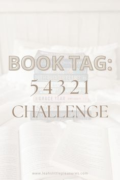 an open book sitting on top of a bed with the words book tag 422 challenge