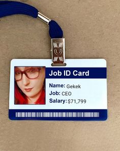 an id card is attached to a lanyard with a name tag that reads, job id card