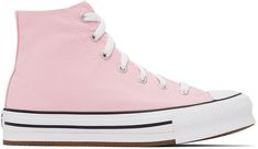 High-top canvas sneakers in pink. · Rubber cap toe · Lace-up closure · Logo graphic printed at inner side · Eyelets at inner side · SmartFOAM insole · Rubber platform midsole · Treaded rubber sole · Platform: H1.5 in Supplier color: Sunrise pink/White/Black Converse US Size: child's foot length 10: 6.6 / 16.8 cm 10.5: 6.8 / 17.3 cm 11: 7 / 17.8 cm 11.5: 7.17 / 18.2 cm 12: 7.3 / 18.5 cm 12.5: 7.5 / 19.1 cm 13: 7.6 / 19.3 cm 13.5: 7.8 / 19.8 cm 1: 8 / 20.3 cm 1.5: 8.1 / 20.6 cm 2: 8.3 / 21.1 cm 2. Light Pink Converse, Converse Girls, Black Chuck Taylors, White Chuck Taylors, Cute Converse, Converse Pink, Girls Converse, Pink Converse, Black Converse