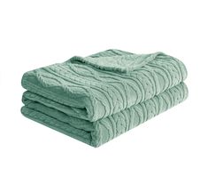 two towels stacked on top of each other next to the same towel folded in different directions