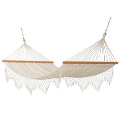 two white hammocks hanging from chains on a white background, one is empty