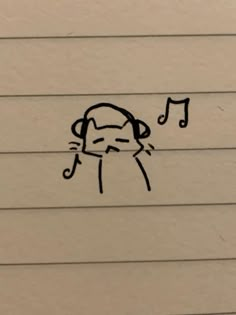 a drawing of a cat with music notes on it