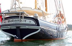 a large black and white boat in the water