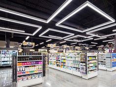 an empty grocery store filled with lots of food and drink items in it's aisles