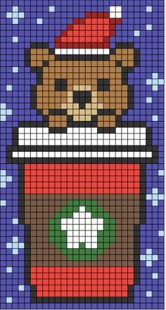 a cross stitch pattern with a bear wearing a santa hat on top of a cup