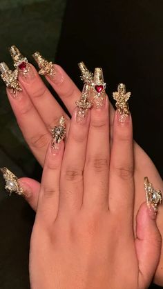 Gold foil cupid angel red heart valentines love cherub gold acrylic gel polygel gelx nails coffin nails Red Heart Charm Nails, Cherub Nails Designs, Cherub Angel Nails, Christmas Angel Nails, Cupid Nail Art, Angel Inspired Nails, Fallen Angel Nails, Angelic Nails Acrylic