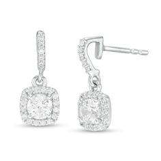 She'll appreciate the contemporary appeal of these smart diamond drop earrings. Fashioned in 14K white gold, each clever drop features a 1/4 ct. diamond sparkling a cushion-shaped frame of diamonds. The diamond-lined hook-shaped post adds further shimmer to the design. Radiant with 3/4 ct. t.w. of diamonds and a brilliant buffed luster, these earrings secure comfortably with friction backs. Formal Cushion Cut Earrings With Diamond Accents, Formal Diamond Earrings With Cushion Cut And Diamond Accents, Formal Cushion Cut Diamond Earrings With Diamond Accents, Cushion Cut Sterling Silver Diamond Earrings For Formal Occasions, Formal Fine Jewelry Cushion Cut Diamond Earrings, Formal Cushion Cut Diamond Earrings With Accents, Formal Cushion Cut Sterling Silver Diamond Earrings, Formal Cushion Cut Diamond Earrings, Classic Dangle Diamond Earrings With Halo Design