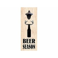 a wooden sign that says beer season with a deer's head and a hat on it