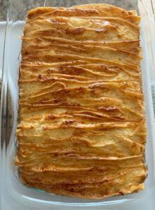 a casserole dish filled with lots of food