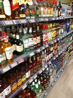 a store filled with lots of bottles of alcohol