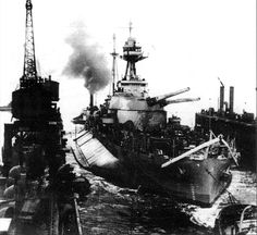 an old photo of a battleship in the water