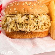 a close up of a sandwich and french fries