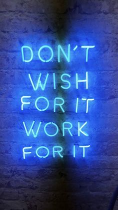 a neon sign that says don't wish for it work for it