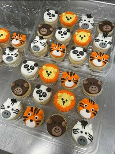 cupcakes decorated with animal faces in plastic containers