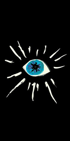 an evil looking eye with white and blue paint splatters on it