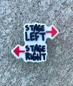 a sticker that says stage left, stage right on the ground with an arrow pointing in opposite directions